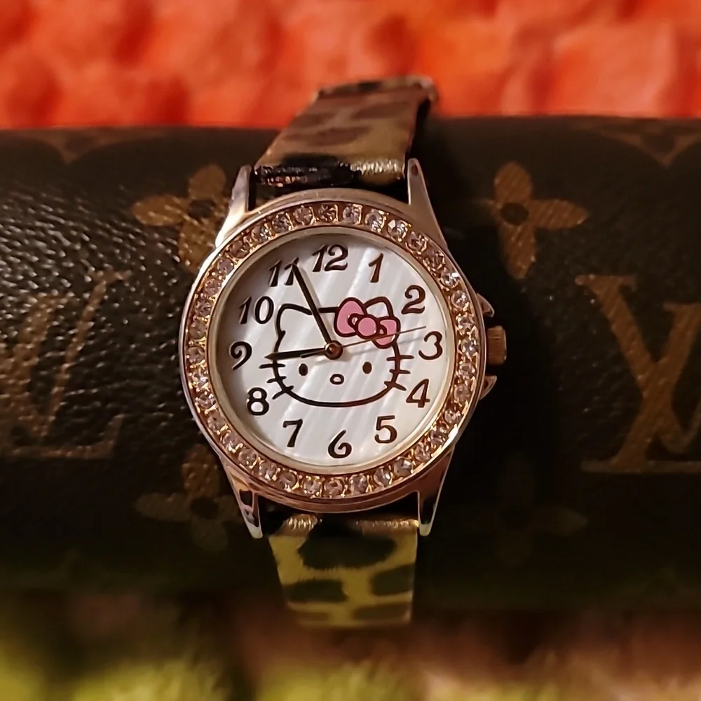 Sanrio Hello Kitty Gold Crystal Studded Bezel Leopard Print Band Textured Face‎